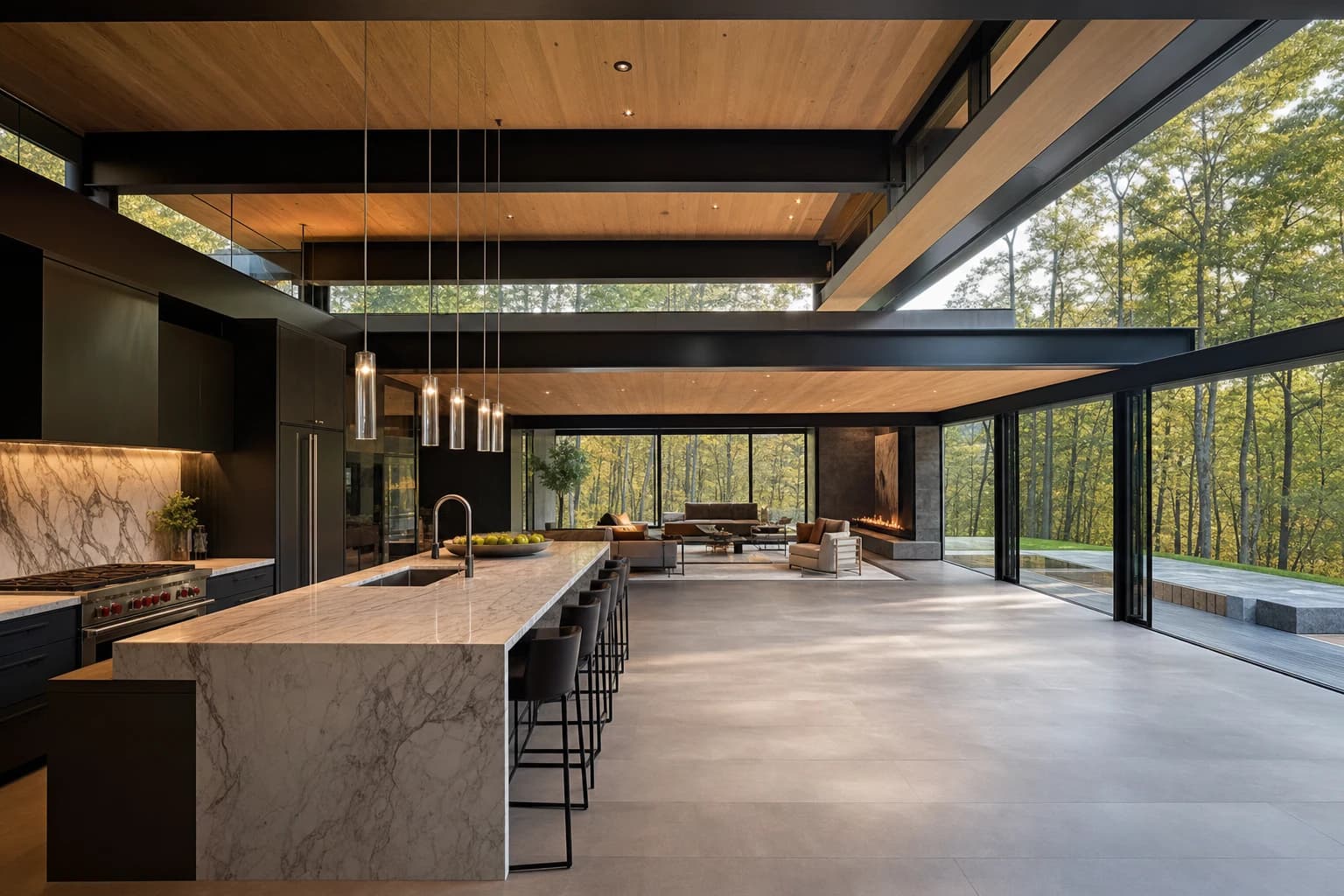 Stunning modern luxury kitchen and sprawling open living space overlooking private woods with massive steel spans without columns
