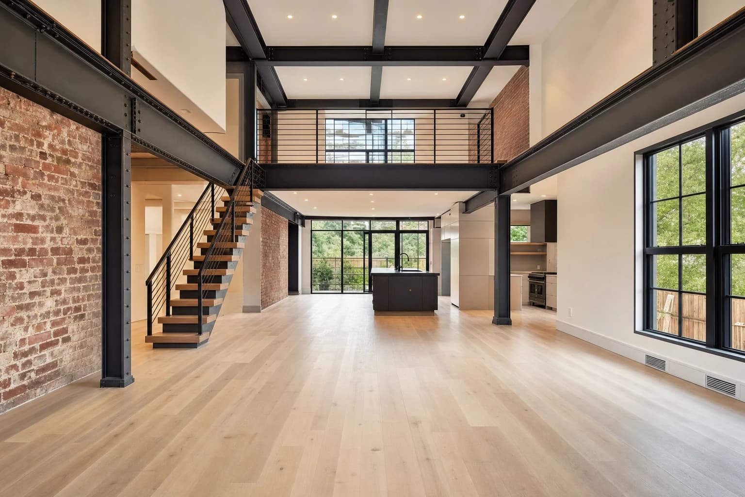 Interior of an ultra-luxury whole-home gut renovation with exposed structural steel I-beams