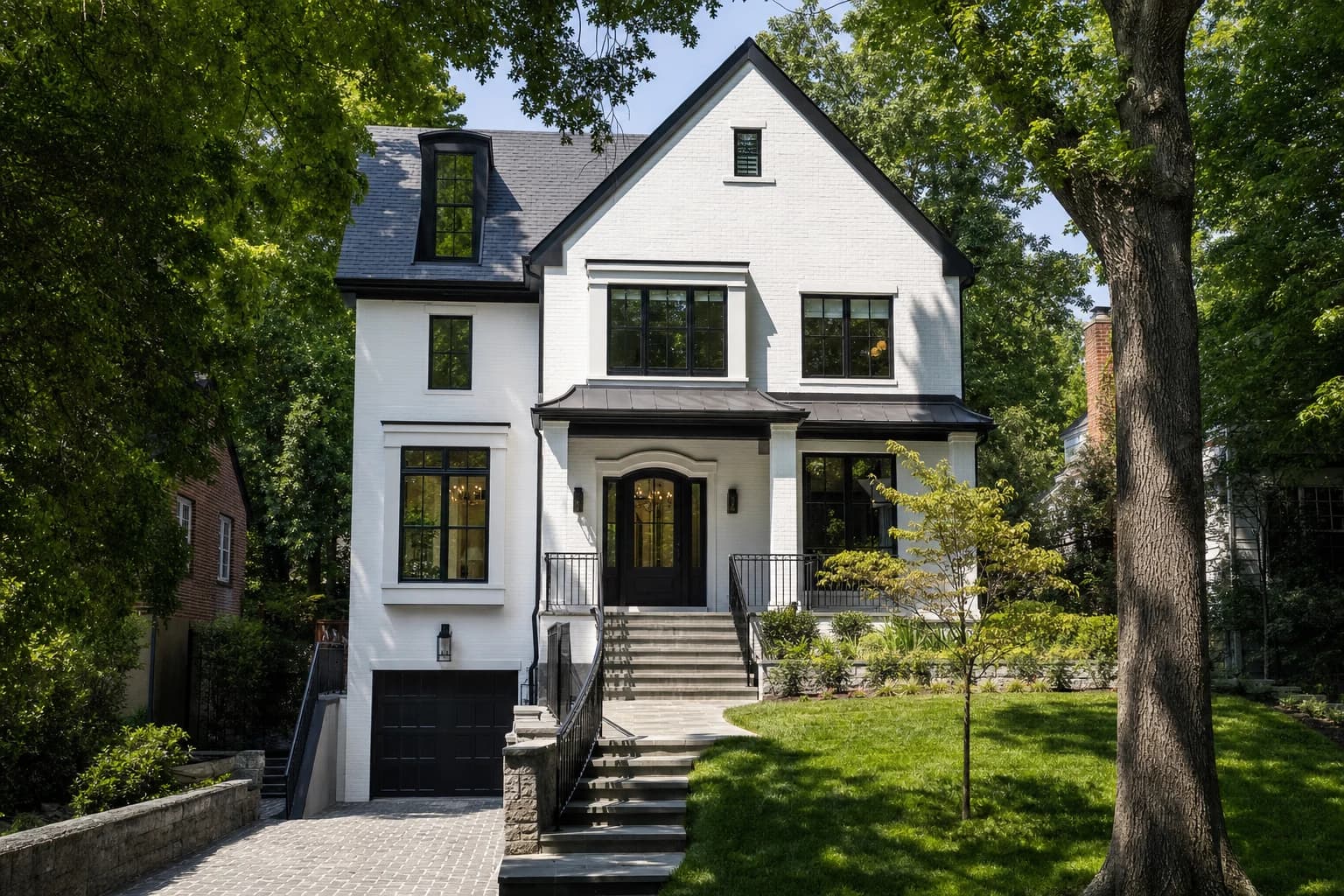 Luxury modern painted brick custom estate built perfectly on a tight suburban lot in North Arlington, Virginia, with mature trees preserved